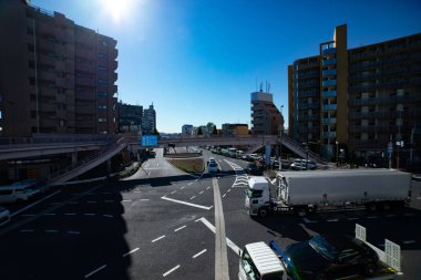 A traffic jam at the crossing in Tokyo wide shot. High quality photo. Setagaya district Tokyo Japan 11.02.2022 Here is a downtown district in Tokyo. 