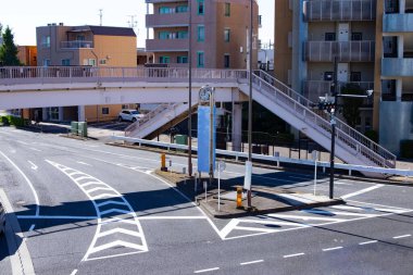 An empty downtown street at the crossing in Tokyo long shot. High quality photo. Setagaya district Tokyo Japan 11.02.2022 Here is a downtown district in Tokyo. 