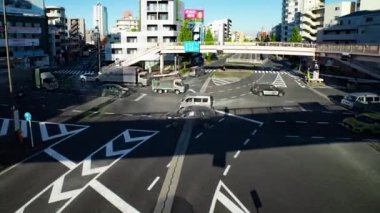 A timelapse of the traffic jam at the crossing in Tokyo wide shot. Setagaya district Tokyo Japan 11.02.2022 Here is a downtown district in Tokyo. High quality 4k footage.