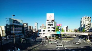 A timelapse of the traffic jam at the crossing in Tokyo wide shot. Setagaya district Tokyo Japan 11.02.2022 Here is a downtown district in Tokyo. High quality 4k footage.