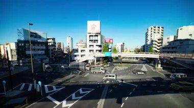 A timelapse of the traffic jam at the crossing in Tokyo wide shot. Setagaya district Tokyo Japan 11.02.2022 Here is a downtown district in Tokyo. High quality 4k footage.