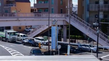 A timelapse of the traffic jam at the crossing in Tokyo. Setagaya district Tokyo Japan 11.02.2022 Here is a downtown district in Tokyo. High quality 4k footage.