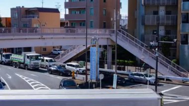 A timelapse of the traffic jam at the crossing in Tokyo. Setagaya district Tokyo Japan 11.02.2022 Here is a downtown district in Tokyo. High quality 4k footage.