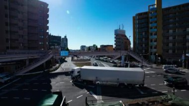 A timelapse of the traffic jam at the crossing in Tokyo wide shot. Setagaya district Tokyo Japan 11.02.2022 Here is a downtown district in Tokyo. High quality 4k footage.