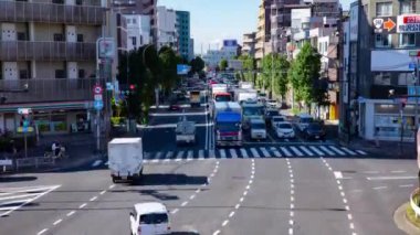 A timelapse of the traffic jam at the downtown street in Tokyo. Setagaya district Tokyo Japan 11.02.2022 Here is a downtown district in Tokyo. High quality 4k footage.