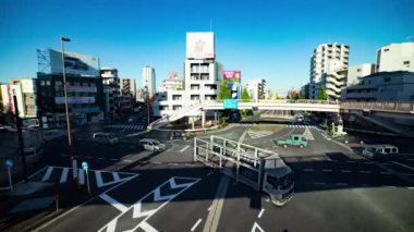 A timelapse of the traffic jam at the crossing in Tokyo wide shot. Setagaya district Tokyo Japan 11.02.2022 Here is a downtown district in Tokyo. High quality 4k footage.