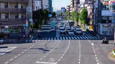 A timelapse of the traffic jam at the downtown street in Tokyo. Setagaya district Tokyo Japan 11.02.2022 Here is a downtown district in Tokyo. High quality 4k footage.