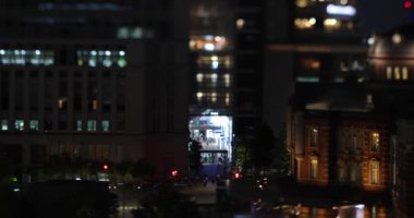 Marunouchi Tokyo 'da gece minyatür bir şehir manzarası. Yüksek kalite 4K görüntü. Chiyoda bölgesi Marunouchi Tokyo 09.13.2022 Tokyo 'nun merkezidir.. 