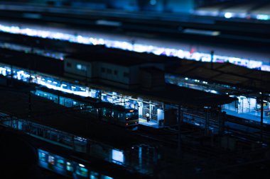 A night miniature cityscape in front of Tokyo station tiltshift. High quality photo. Chiyoda district Marunouchi Tokyo Japan 09.13.2022 It is center of the city in Tokyo. 