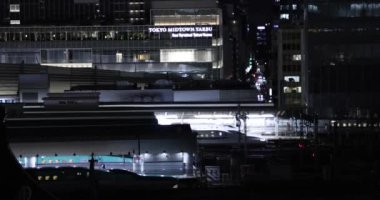 A night cityscape in front of Tokyo station high angle long shot. High quality 4k footage. Chiyoda district Marunouchi Tokyo Japan 09.13.2022 It is center of the city in Tokyo. 