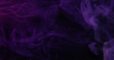 Pink ink dropped in water on white background . High quality 4k footage