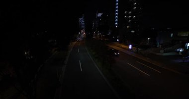 A night traffic jam at the city crossing in Tokyo. High quality 4k footage. Nakano district Higashinakano Tokyo Japan 10.11.2022 Here is an electric quarter in Tokyo. It is. High quality 4k footage
