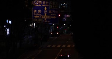 A night traffic jam at the city crossing in Tokyo. High quality 4k footage. Nakano district Higashinakano Tokyo Japan 10.11.2022 Here is an electric quarter in Tokyo. It is. High quality 4k footage