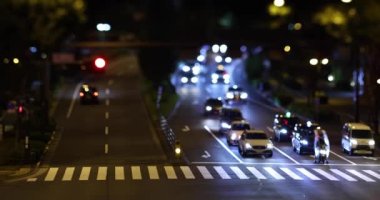 Tokyo 'da bir gece trafiği sıkışıklığı. Yüksek kalite 4K görüntü. Nakano Bölgesi Higashinakano Tokyo Japonya 10.11.2022 Tokyo 'da bir elektrik çeyreği. Evet, öyle. Yüksek kalite 4k görüntü