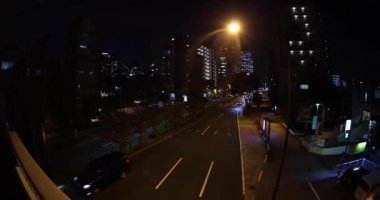 A night traffic jam at the city crossing in Tokyo. High quality 4k footage. Nakano district Higashinakano Tokyo Japan 10.11.2022 Here is an electric quarter in Tokyo. It is. High quality 4k footage