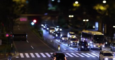 Tokyo 'da bir gece trafiği sıkışıklığı. Yüksek kalite 4K görüntü. Nakano Bölgesi Higashinakano Tokyo Japonya 10.11.2022 Tokyo 'da bir elektrik çeyreği. Evet, öyle. Yüksek kalite 4k görüntü