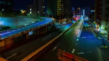 Tokyo 'daki Yamate Bulvarı' nda trafik sıkışıklığı gecesi. Yüksek kalite 4K görüntü. Meguro bölgesi Ohashi Tokyo Japonya - 02.09.2023 Şehir merkezinde neon sokağıdır. Yüksek kalite 4k görüntü