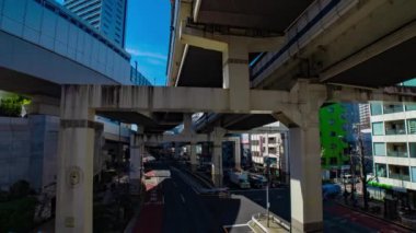 Tokyo 'daki şehir caddesinde trafik sıkışıklığı zamanı. Yüksek kalite 4K görüntü. Meguro bölgesi Tokyo 03.16.2023 Tokyo 'nun merkezidir.. 