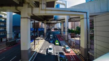 Tokyo 'daki şehir caddesinde trafik sıkışıklığı zamanı. Yüksek kalite 4K görüntü. Meguro bölgesi Tokyo 03.16.2023 Tokyo 'nun merkezidir.. 