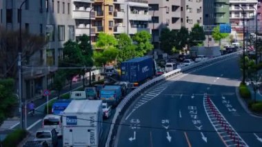 Tokyo 'daki şehir caddesinde trafik sıkışıklığı zamanı. Yüksek kalite 4K görüntü. Meguro bölgesi Tokyo 03.16.2023 Tokyo 'nun merkezidir.. 