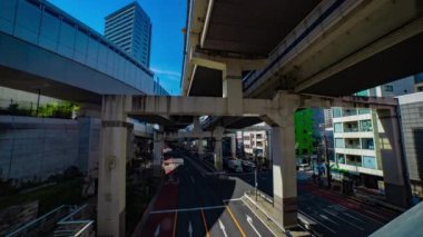 Tokyo 'daki şehir caddesinde trafik sıkışıklığı zamanı. Yüksek kalite 4K görüntü. Meguro bölgesi Tokyo 03.16.2023 Tokyo 'nun merkezidir.. 