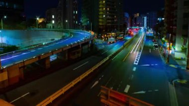 Tokyo 'daki Yamate Bulvarı' nda trafik sıkışıklığı gecesi. Yüksek kalite 4K görüntü. Meguro bölgesi Ohashi Tokyo Japonya - 02.09.2023 Şehir merkezinde neon sokağıdır. Yüksek kalite 4k görüntü