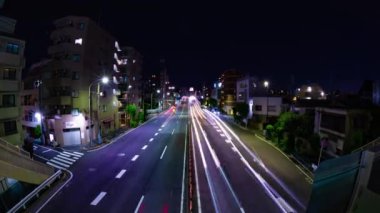Tokyo 'daki şehir caddesindeki trafik sıkışıklığının gece zamanı. Yüksek kalite 4K görüntü. Setagaya bölgesi Tokyo 05.08.2023 Tokyo 'nun merkezidir.. 