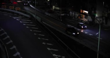 Şehir caddesindeki trafik sıkışıklığının gece manzarası. Yüksek kalite 4K görüntü. Meguro bölgesi Tokyo 03.06.2023 Tokyo 'nun merkezidir.. 