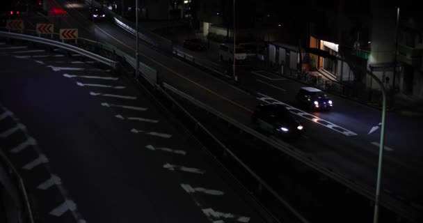 都市の街の通りで交通渋滞の夜の街並み 高品質4K映像 目黒区東京都03 2023東京都内の中心部です — ストック動画