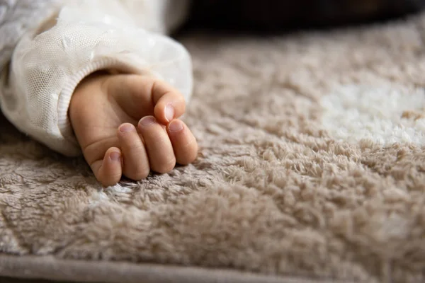 Left Hand Sleeping Asian Baby Carpet High Quality Photo 2023 Stock Image
