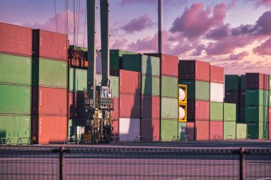 Containers and cranes near the port in Aomi Tokyo telephoto shot. High quality photo. Koto district Aomi Tokyo Japan 01.20.2023 Here is a container port in Tokyo. It is called Aomi container port.  clipart