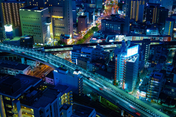 A night of panorama cityscape near the railway in Osaka telephoto shot. High quality photo. Asahi district Osaka Japan 04.10.2023 Here is near Takarazuka railway in Osaka. 