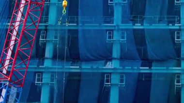 Tokyo 'da yapım aşamasındaki vincin zaman çizelgesi. Yüksek kalite 4K görüntü. Koto bölgesi Ariake Tokyo 02.15.2023 Tokyo 'da bir elektrik çeyreği. Tokyo 'nun merkezindedir.. 