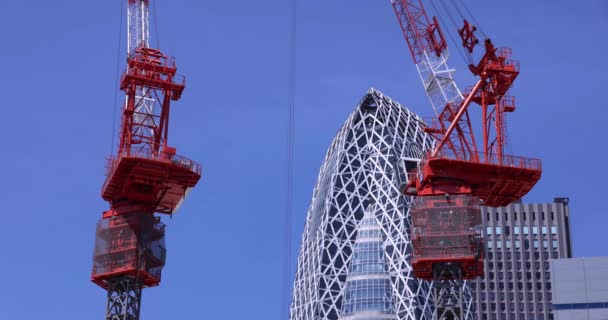 Зупинка Кранів Вершині Будівлі Діловому Місті Токіо Високоякісні Кадри Шинджуку — стокове відео