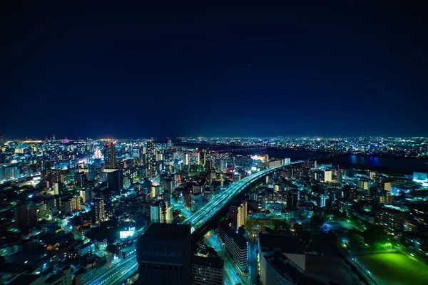 大阪の淀川付近の夜景が撮影されました 高品質の写真 大阪アサヒ地区 2023 ここは大阪でよく知られている川の近くにあります — ストック写真