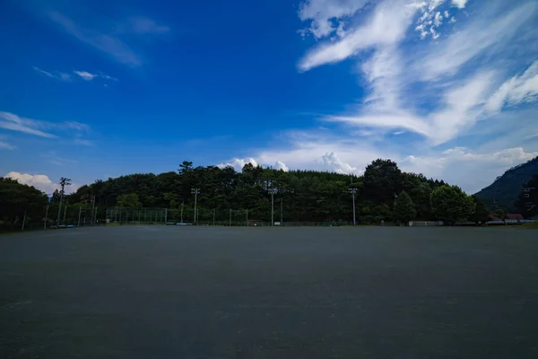 A closed elementary school ground at the country side wide shot. High quality photo. Agatsuma district Nakanojo Gunma Japan 07.18.2023 It is a closed school at the country side in Gunma prefecture.