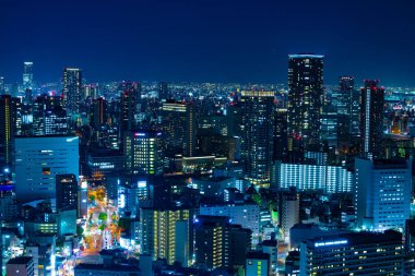 Osaka yüksek açılı gece panoramik şehir manzarası. Yüksek kalite fotoğraf. Asahi Bölgesi Osaka Japonya 04.10.2023 Burası Osaka 'daki Takarazuka Demiryolu yakınında.. 