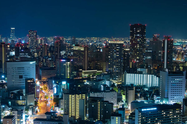 A night panoramic cityscape in Osaka high angle. High quality photo. Asahi district Osaka Japan 04.10.2023 Here is near Takarazuka railway in Osaka.