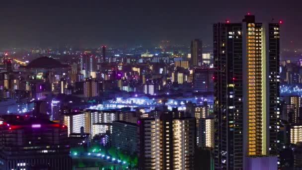Uma Cronologia Noturna Luzes Construção Osaka Telefoto Tiro Imagens Alta — Vídeo de Stock
