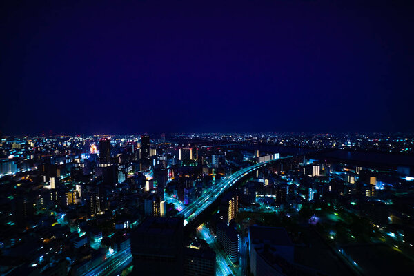 A night panoramic cityscape near Yodo river in Osaka wide shot. High quality photo. Asahi district Osaka Japan 04.09.2023 Here is near the well known river in Osaka.