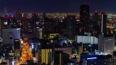 Osaka 'daki Panorama şehir manzarasının şafak vakti. Yüksek kalite 4K görüntü. Fukushima bölgesi Osaka Japonya 04.11.2023