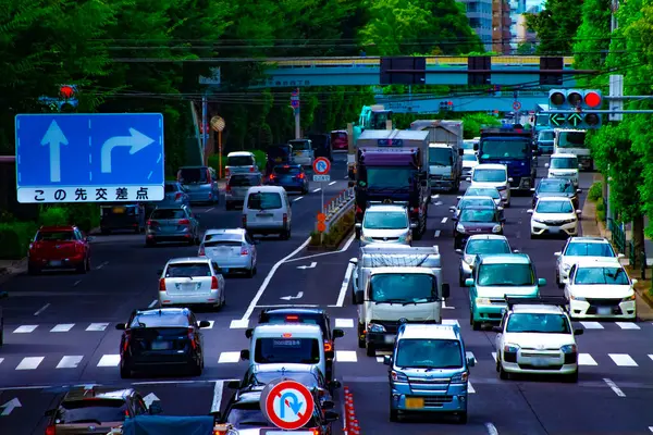 stock image A downtown street at Kanpachi avenue in Tokyo daytime. Setagaya district Tokyo Japan - 07.26.2019 : It is a center of the city in tokyo.