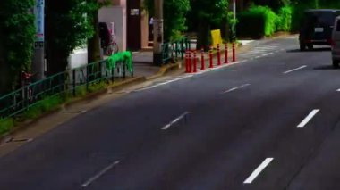 Otomobil sokağının gündüz vakti uzun menzilli çekimlerinin zamanlaması. Setagaya Tokyo Bölgesi - 07.26.2019: Tokyo 'nun merkezidir..