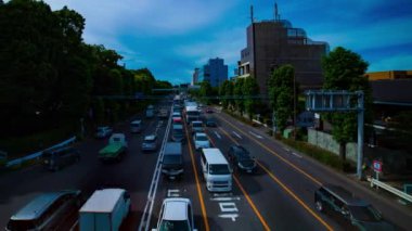 Şehir merkezindeki caddede geniş açılı çekim yapan bir zaman çizelgesi. Setagaya Tokyo Bölgesi - 08.06.2019: Tokyo 'nun merkezidir..