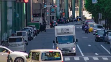 Tokyo 'daki şehir caddesinde trafik sıkışıklığı zamanı. Yüksek kalite 4K görüntü. Chiyoda bölgesi Marunouchi Tokyo 05.10.2024 Tokyo 'nun merkezidir.. 