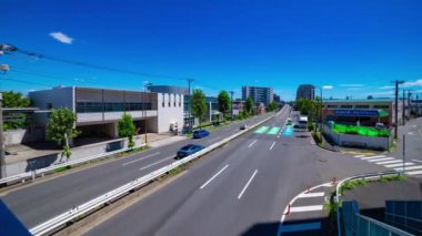 Tokyo 'daki Mejiro Bulvarı' ndaki şehir merkezinde trafik sıkışıklığı zamanı. Yüksek kalite 4K görüntü. Nerima Bölgesi Yahara Tokyo Japonya 09.05.2023