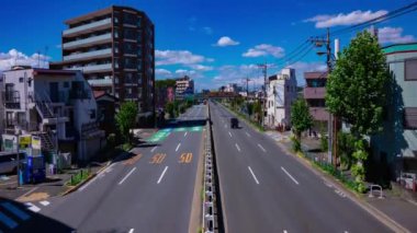 Tokyo 'daki Mejiro Bulvarı' ndaki şehir merkezinde trafik sıkışıklığı zamanı. Yüksek kalite 4K görüntü. Nerima Bölgesi Yahara Tokyo Japonya 09.05.2023