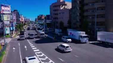 Tokyo 'daki Mejiro Bulvarı' ndaki şehir merkezinde trafik sıkışıklığı zamanı. Yüksek kalite 4K görüntü. Nerima Bölgesi Yahara Tokyo Japonya 09.05.2023