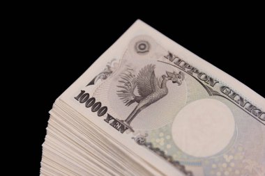 Japon eski banknotlarının bir sürü faturası kapanır. Yüksek kalite fotoğraf. 10.09.2024 Bu eski bir Japon para birimi.