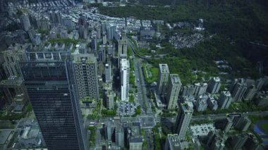 Tayvan 'daki Taipei101 gökdeleni etrafındaki panoramik yüksek açı görüntüsü. Yüksek kalite 4K görüntü. Taipei Tayvan 'ın Taipei ilçesi. 04.11.2025 Taipei' nin merkezidir.. 